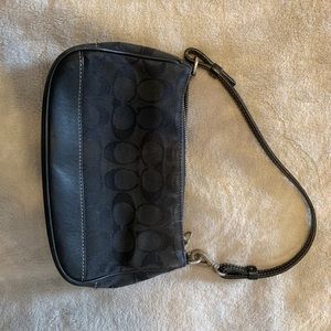 Coach medium clutch lightly worn